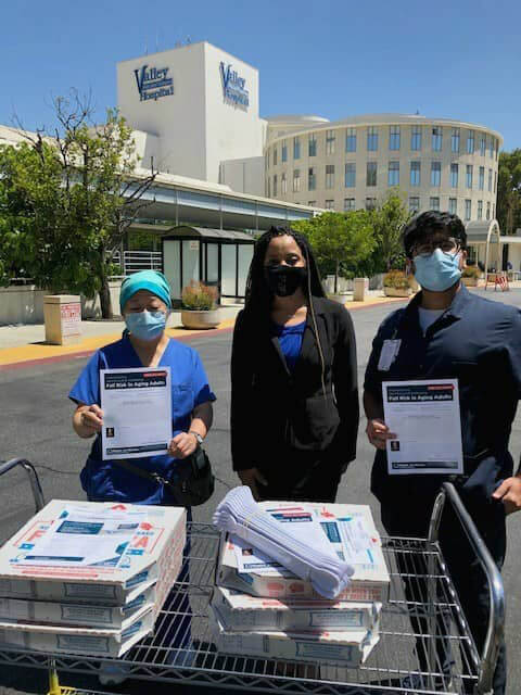 Valley Presbyterian staff with Domino's pizza boxes