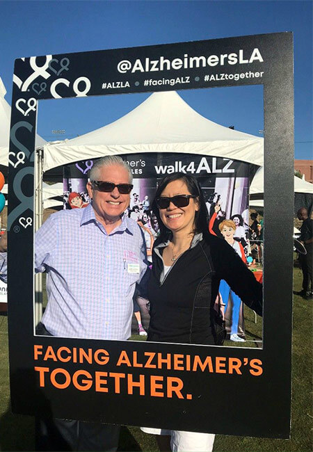 Larry and Lilan in a social media frame for the Walk4Alz Walk 