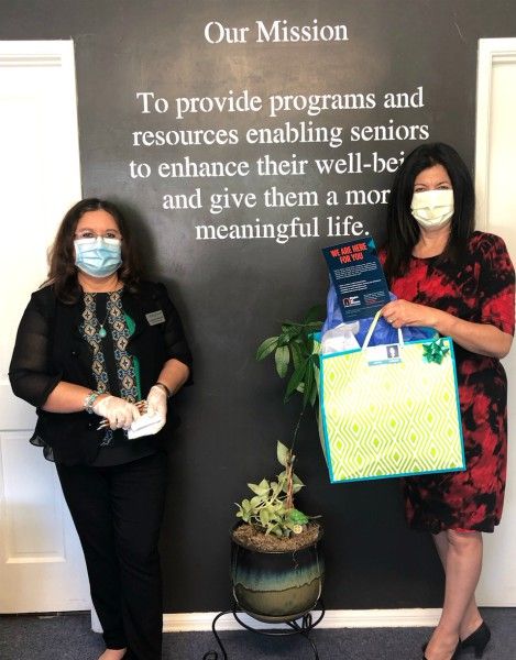 Carmen on left and Senior Advocate Darlene Weber on right both in masks