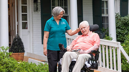 walk-client-caregiver-outside-personal-mobile